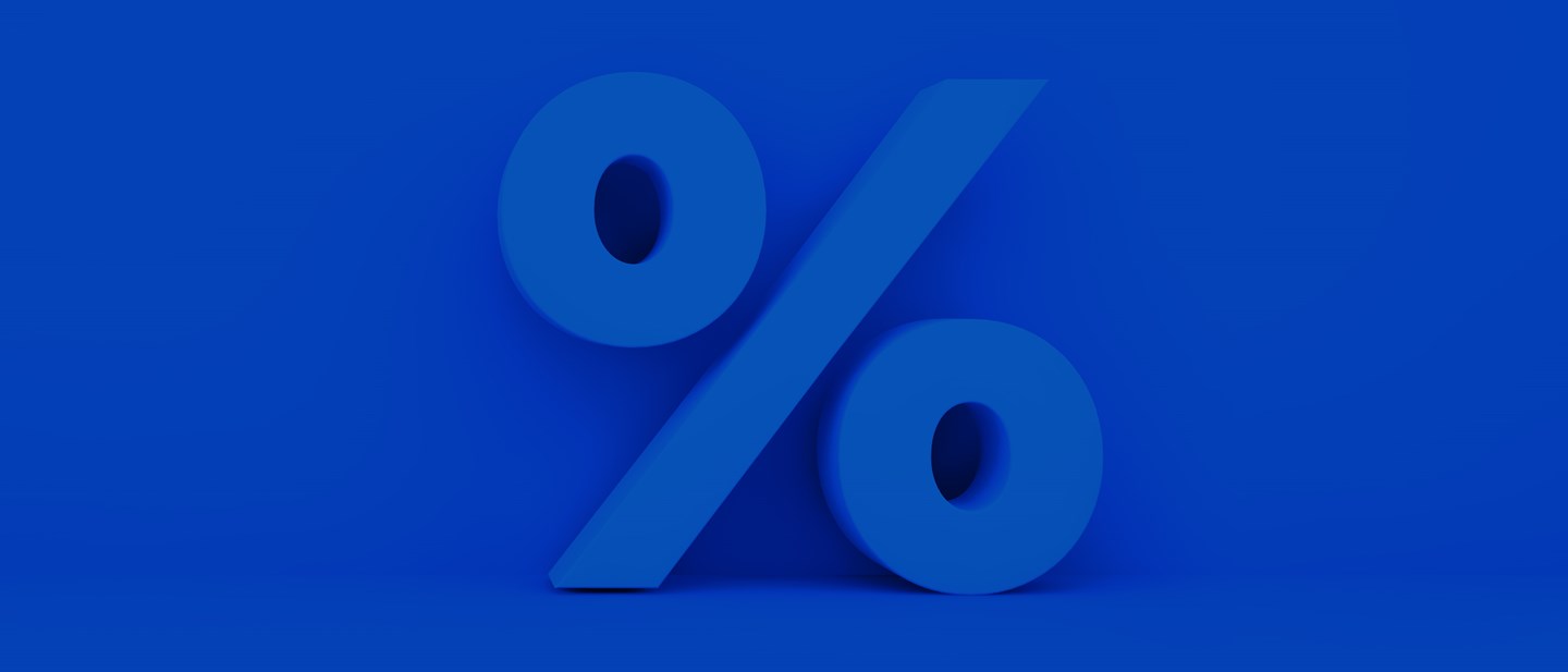 Blåt procenttegn på blå baggrund 